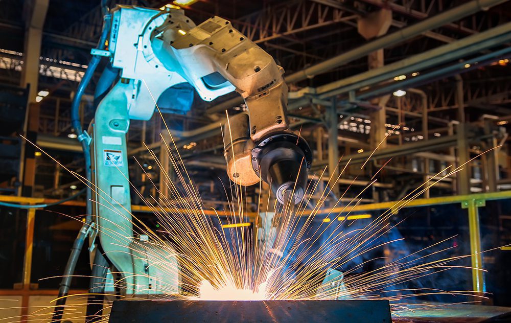 Industrial Robot Welding a Car 