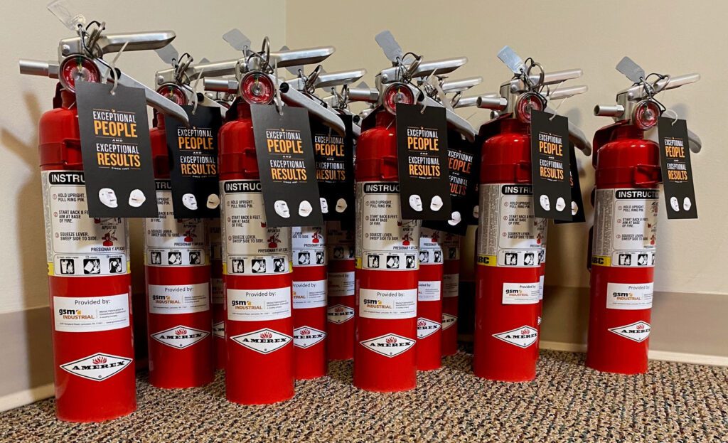 fire extinguishers lined up for employees