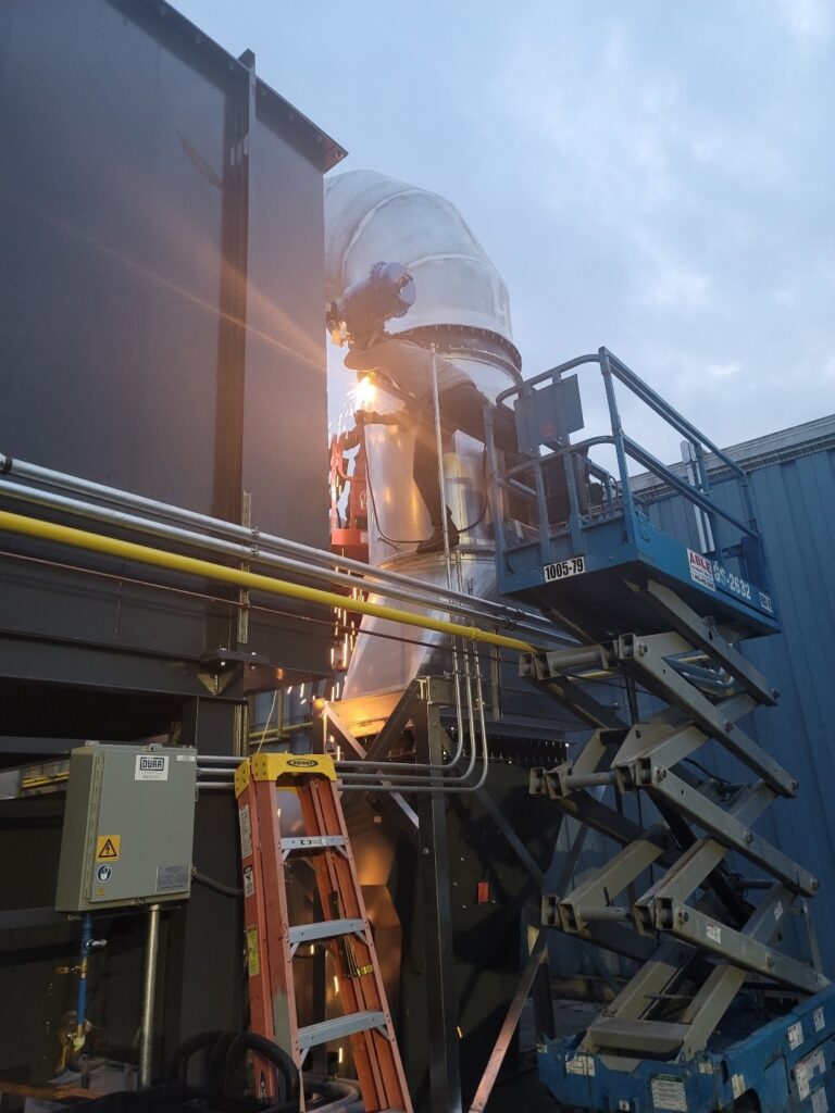 An image of ductwork being welded.