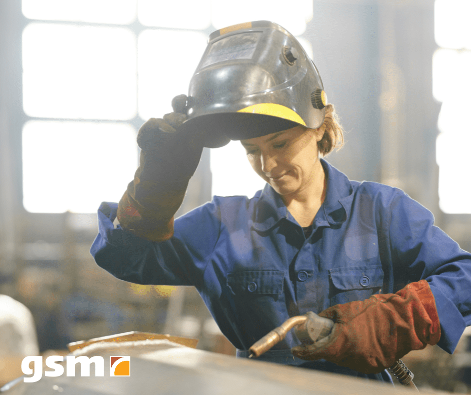 women welders of GSM Industrial in the shop welding