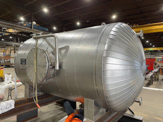 ASME-compliant condensate tank completed by GSM Industrial, featuring mineral wool insulation and a removable manway cover, ready for installation in Grand Saline, TX.