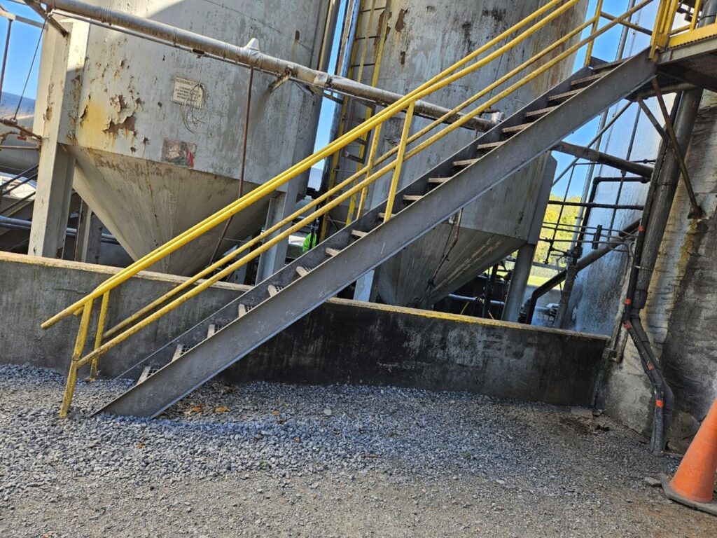 Original deteriorating stairs before GSM Industrial access upgrade in East Earl, PA