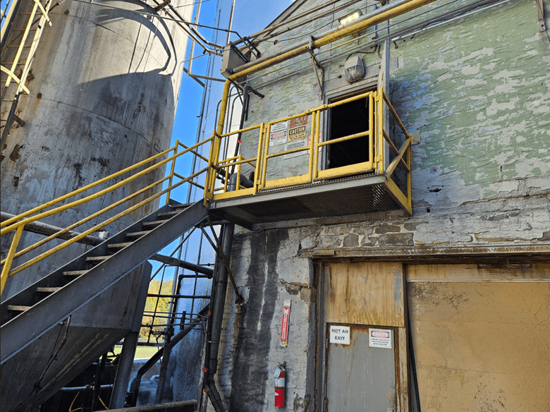 Aging second-story platform prior to GSM Industrial custom fabrication and install