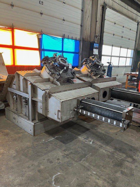 Completed custom 316 stainless steel gate housings fabricated by GSM Industrial — 3/8-inch 316SS plate, 3,325 lbs per unit, ASME weld procedures applied throughout