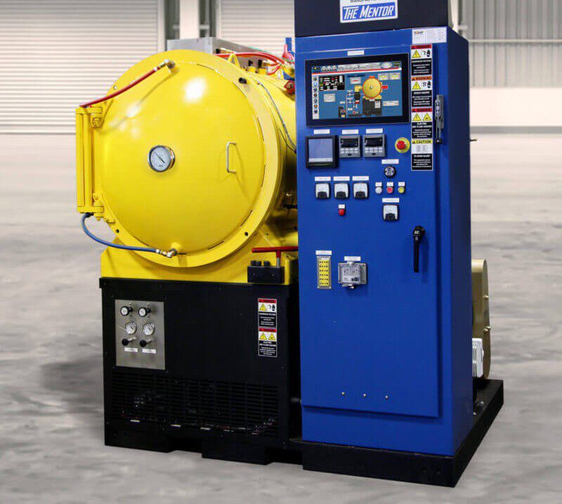 A fully assembled Mentor vacuum furnace, the finished unit built up from a GSM-fabricated chamber. Model HFL-2018-2IQ reaches 2,400 degrees F with internal gas quenching to 15 PSIG. Photo courtesy of the customer.